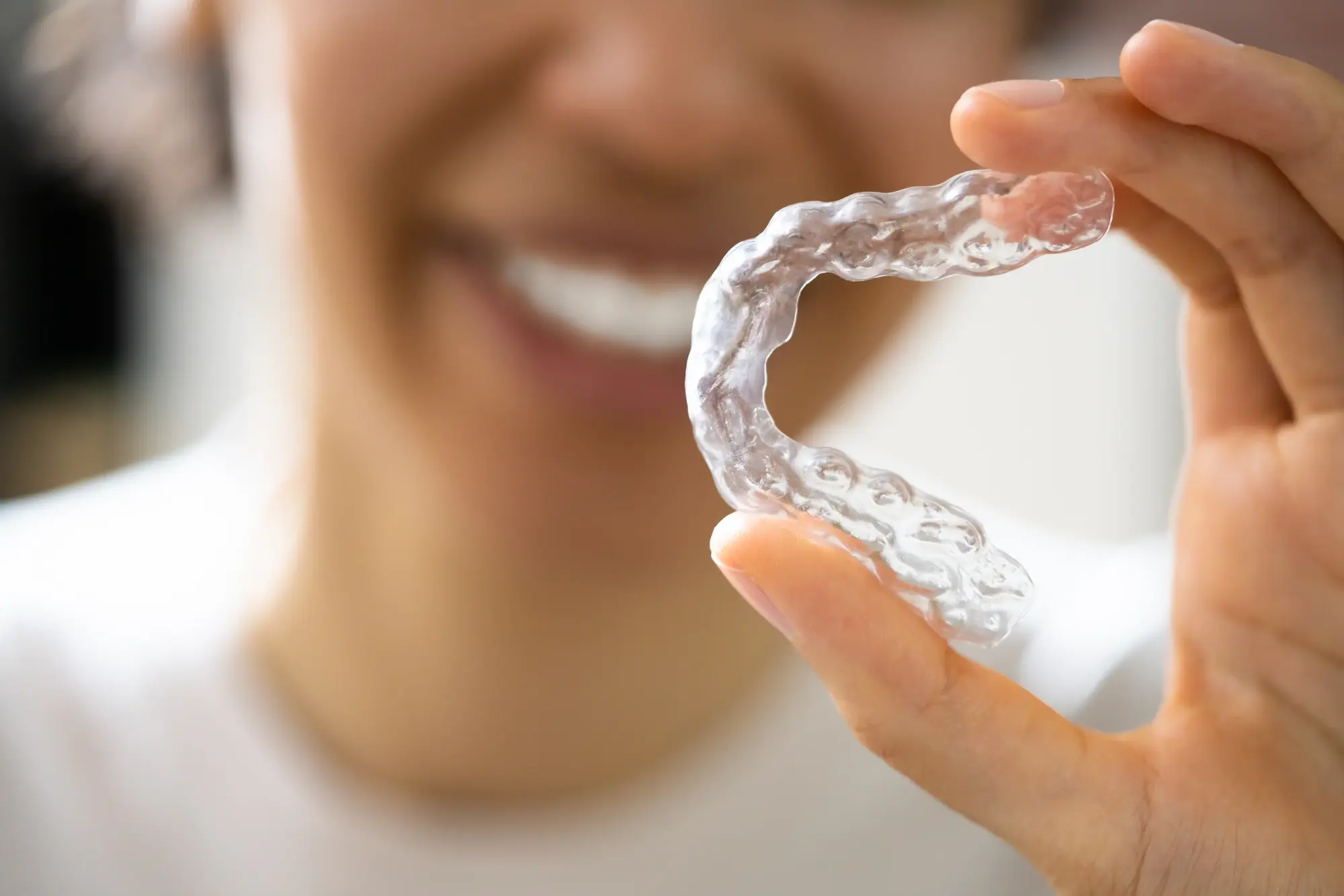 Clear Invisalign aligner close-up